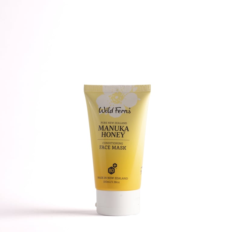 Wild Ferns Manuka Honey face mask tube with gold and white gradient packaging on white background